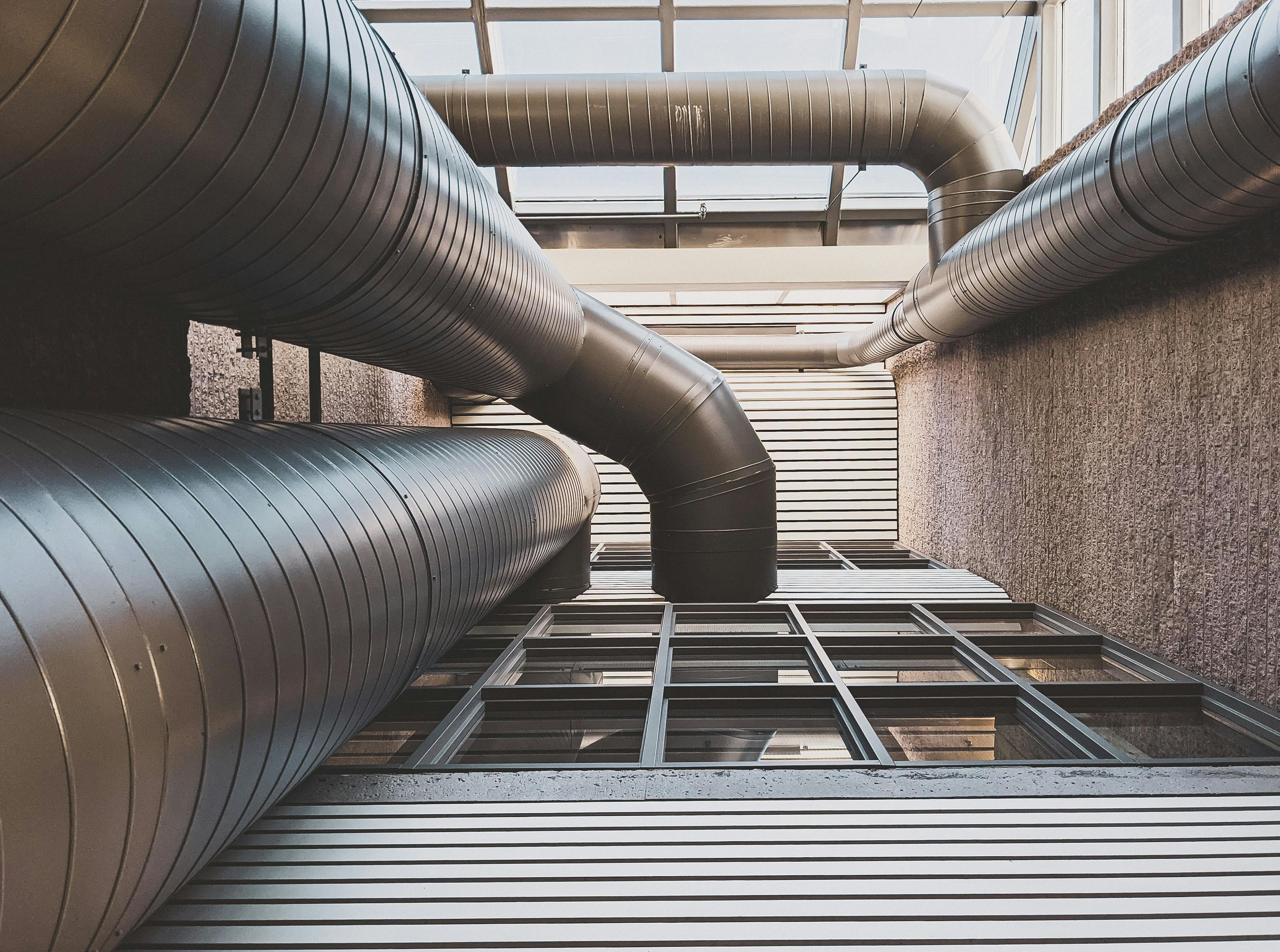 image of pipes entering building