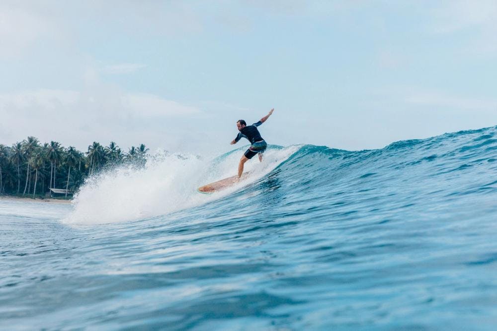Kyle surfing