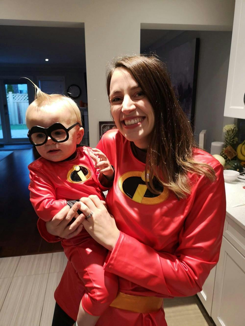 NJ and her toddler in matching costumes from 'The Incredibles'